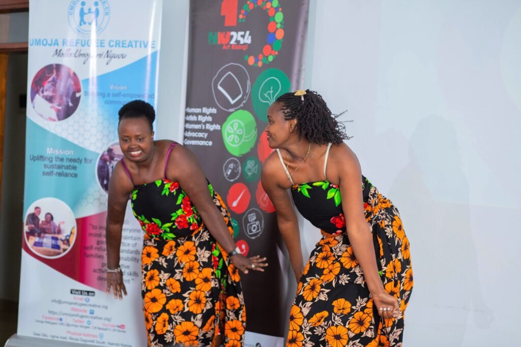 Two Traditional women dance at the Beyond My Status event